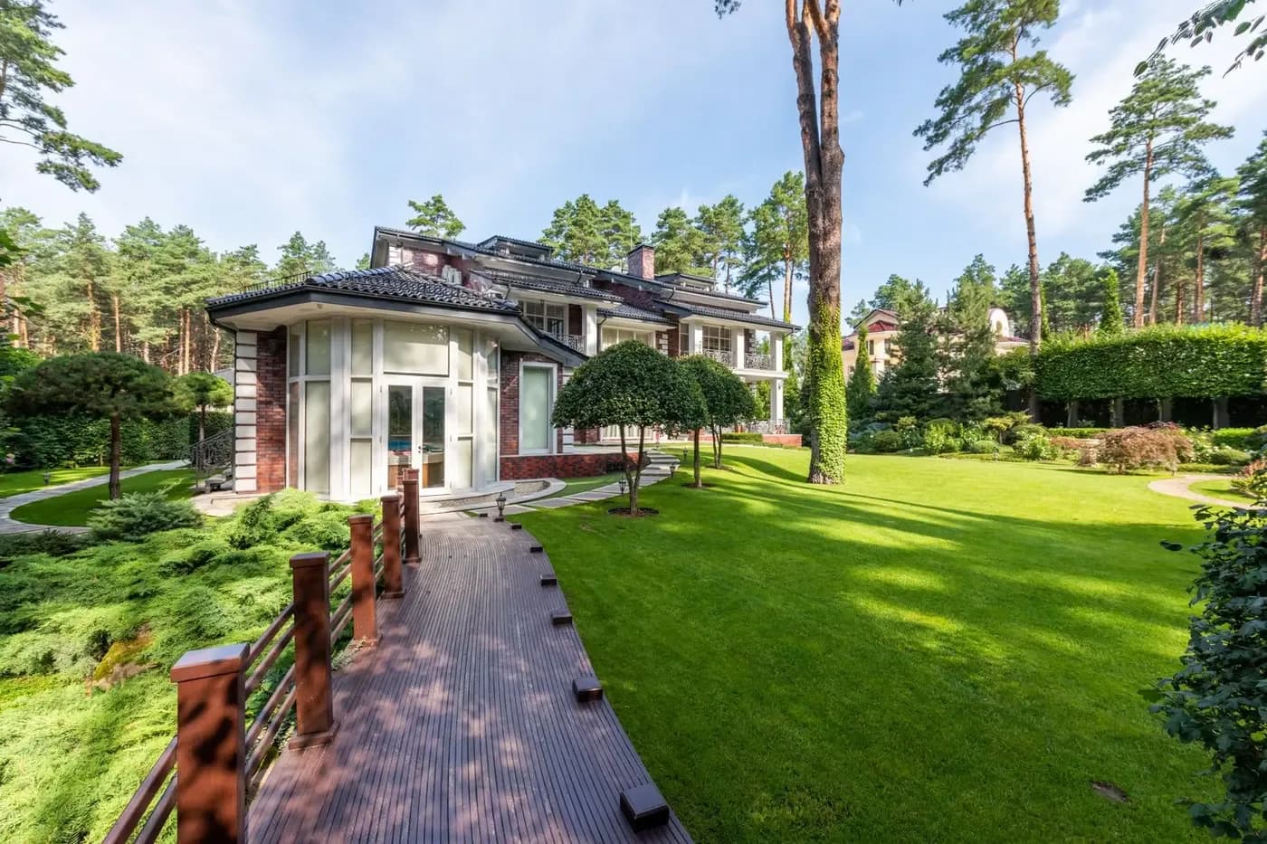 Representative landscaped residential property with a clear pedestrian path between garden areas and living spaces
