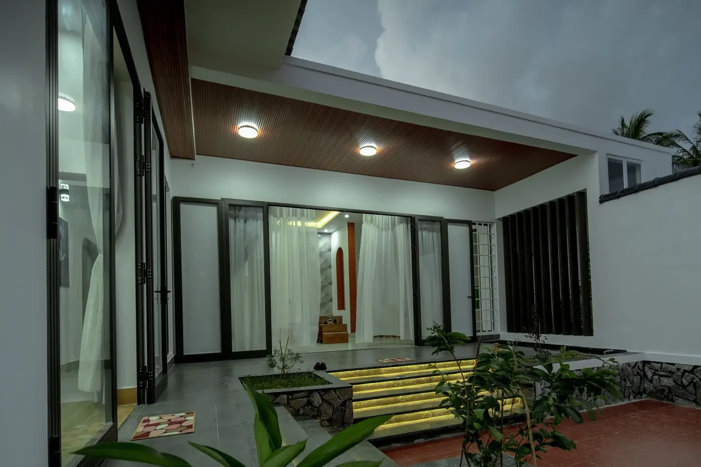 Representative covered courtyard with separate soffit, step, and interior lighting zones