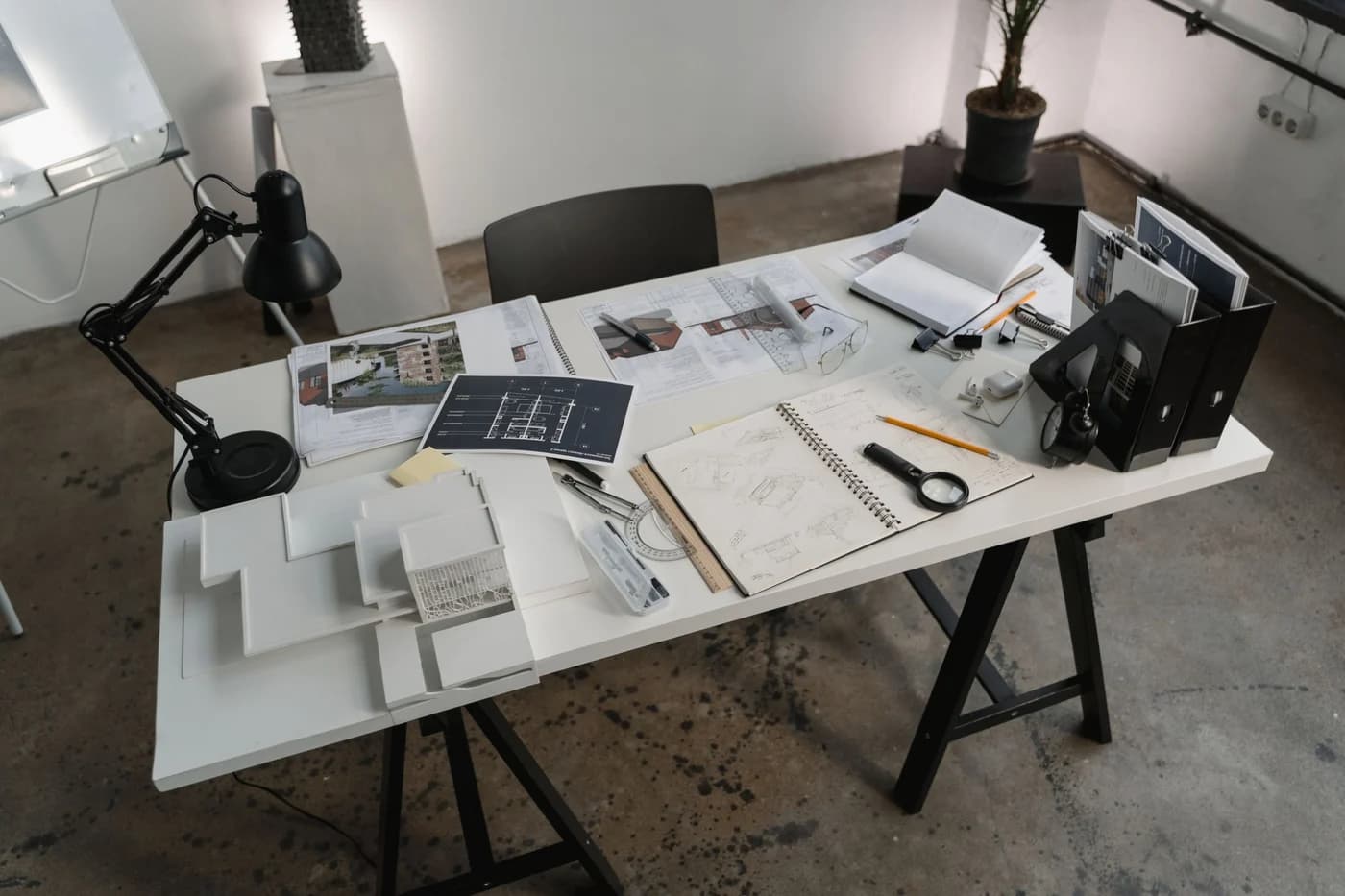 Representative stock photograph of residential plans and design documents arranged for coordination