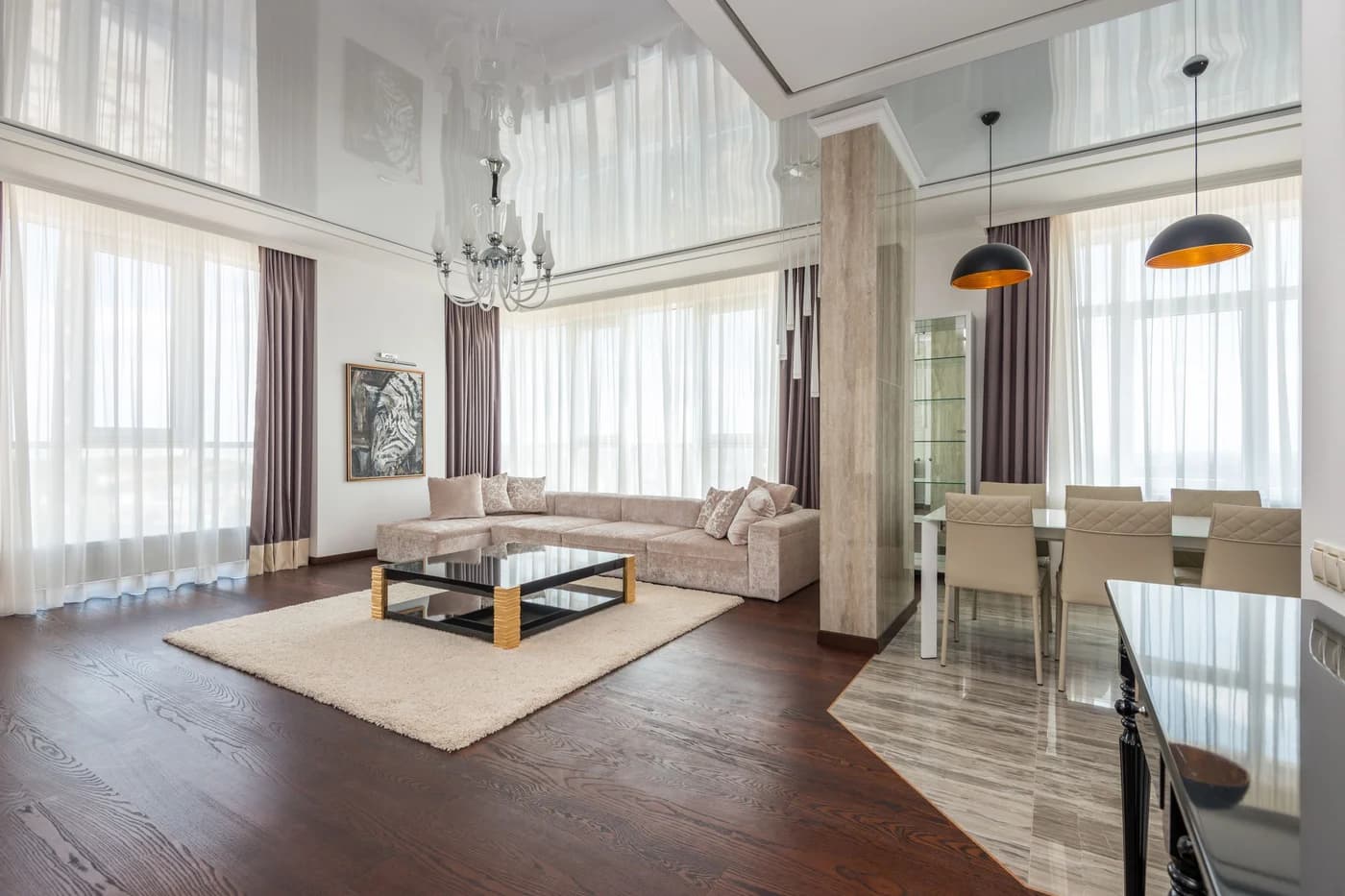 Representative stock photograph of a finished high-end living area with coordinated materials and lighting